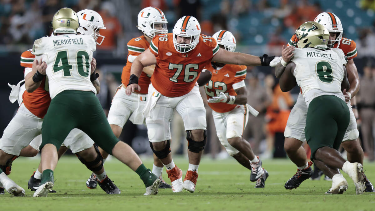 Miami Hurricanes offensive lineman Ryan Rodriguez (76) blocks during during the NCAA football game against the South Florida Bulls at Hard Rock Stadium in Miami Gardens, Florida, on Saturday, September 13, 2025.